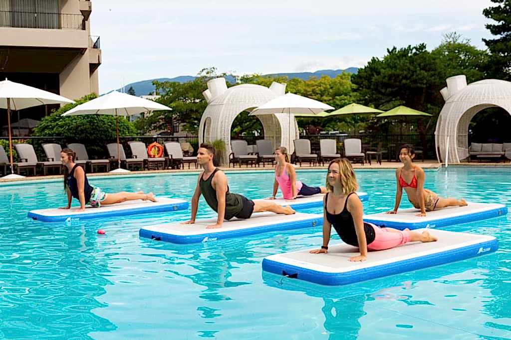 Just Add WaterYoga, outdoor liquid yoga class doing updog